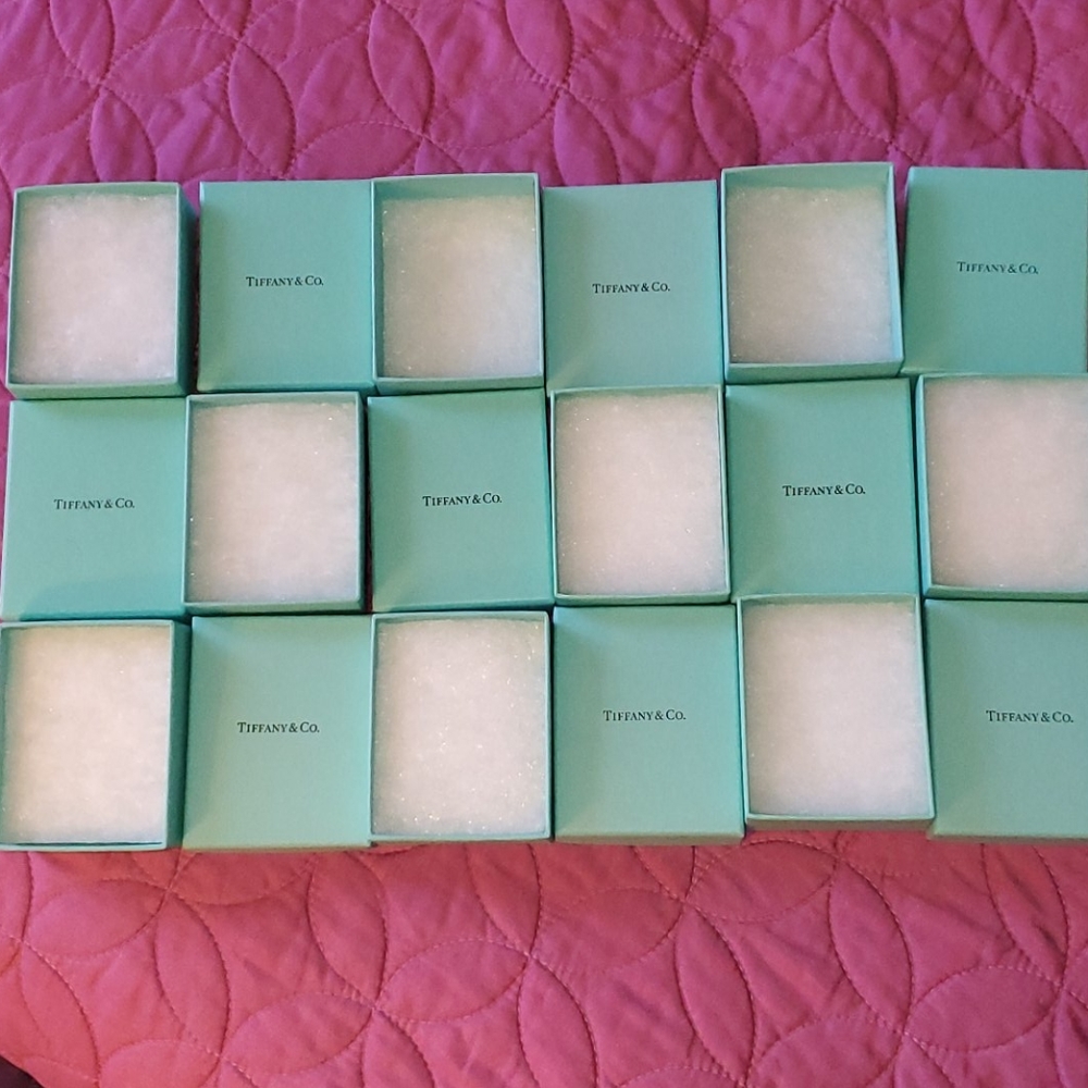 Nine empty Tiffany boxes.